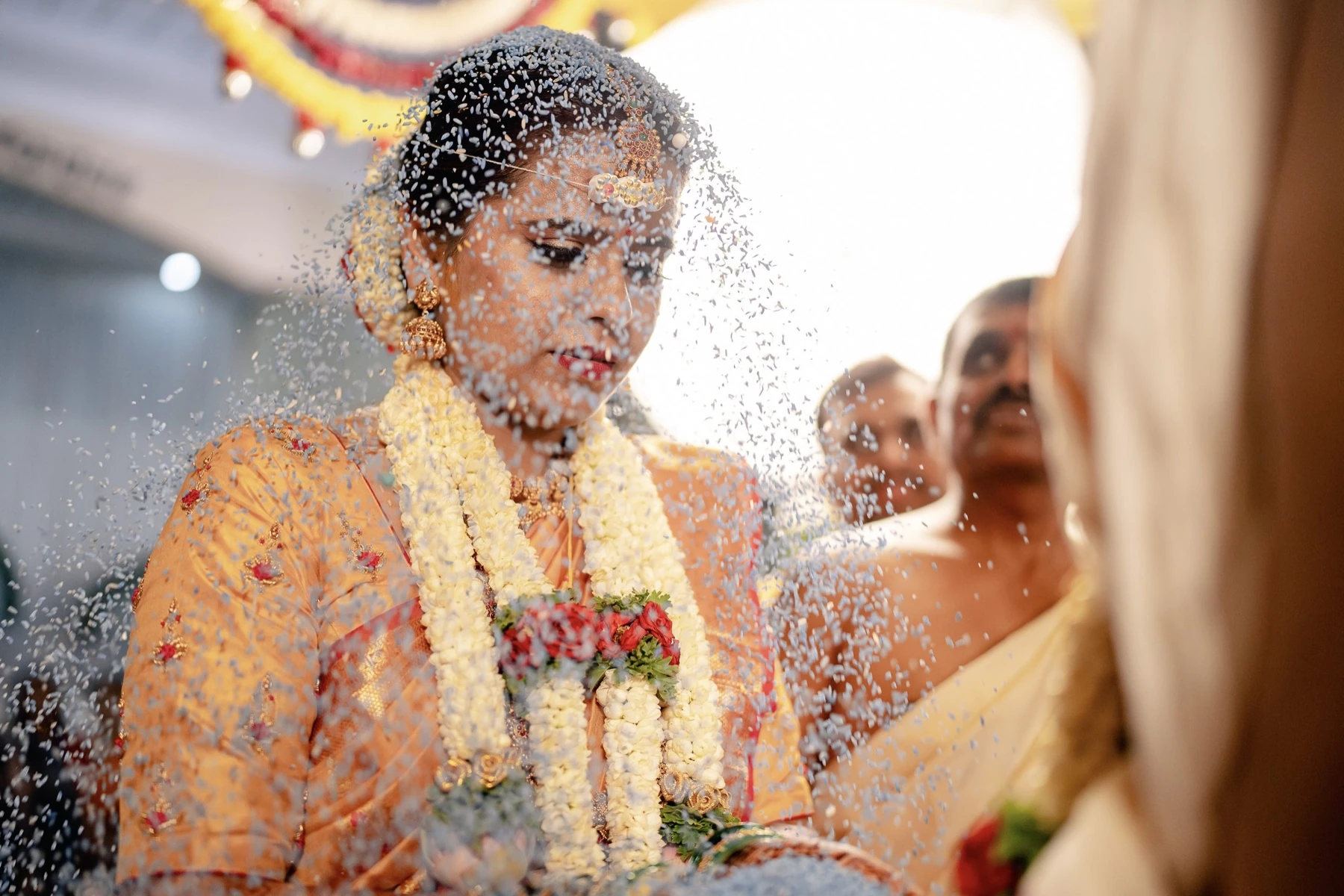 A bride during a ritual, photographed by Nuptial Diaries