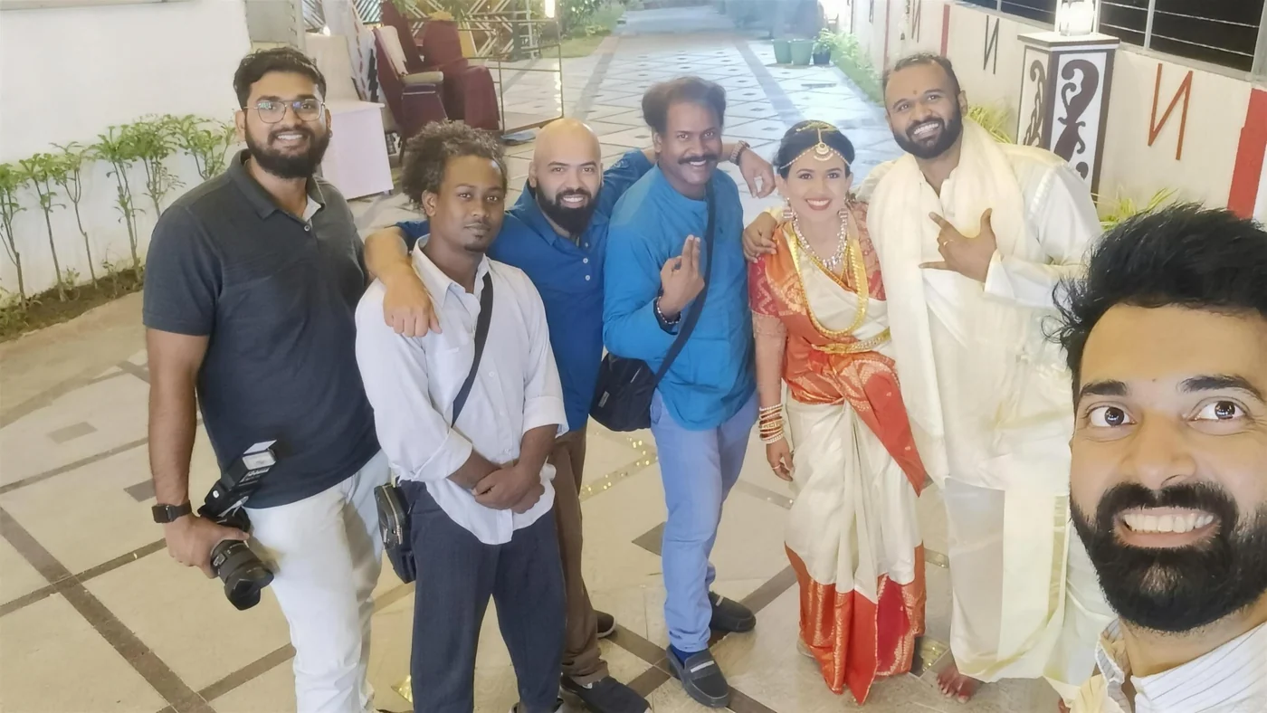 The Nuptial Diaries team with a couple at the end of their wedding day