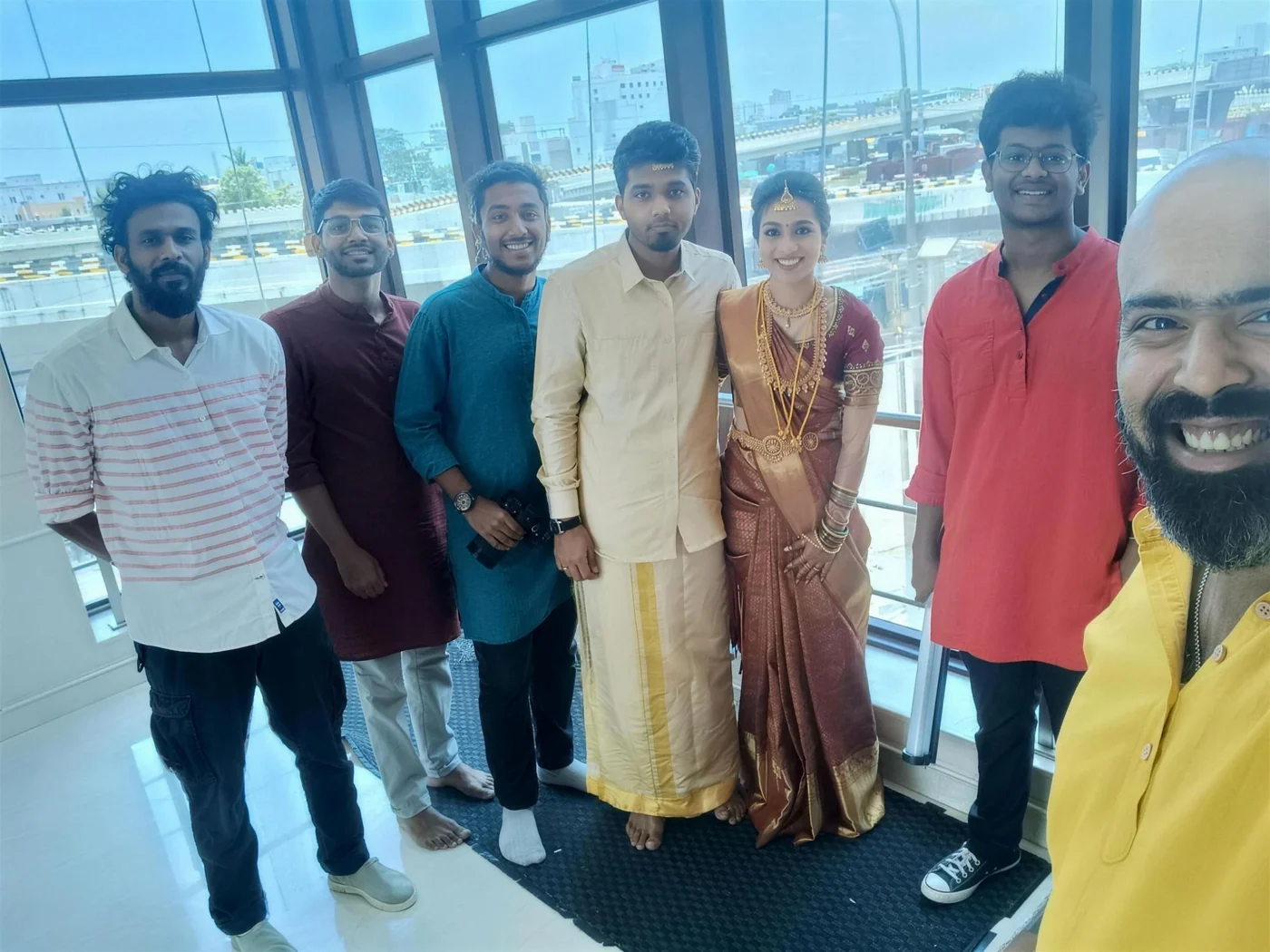 The Nuptial Diaries team with a couple after their wedding